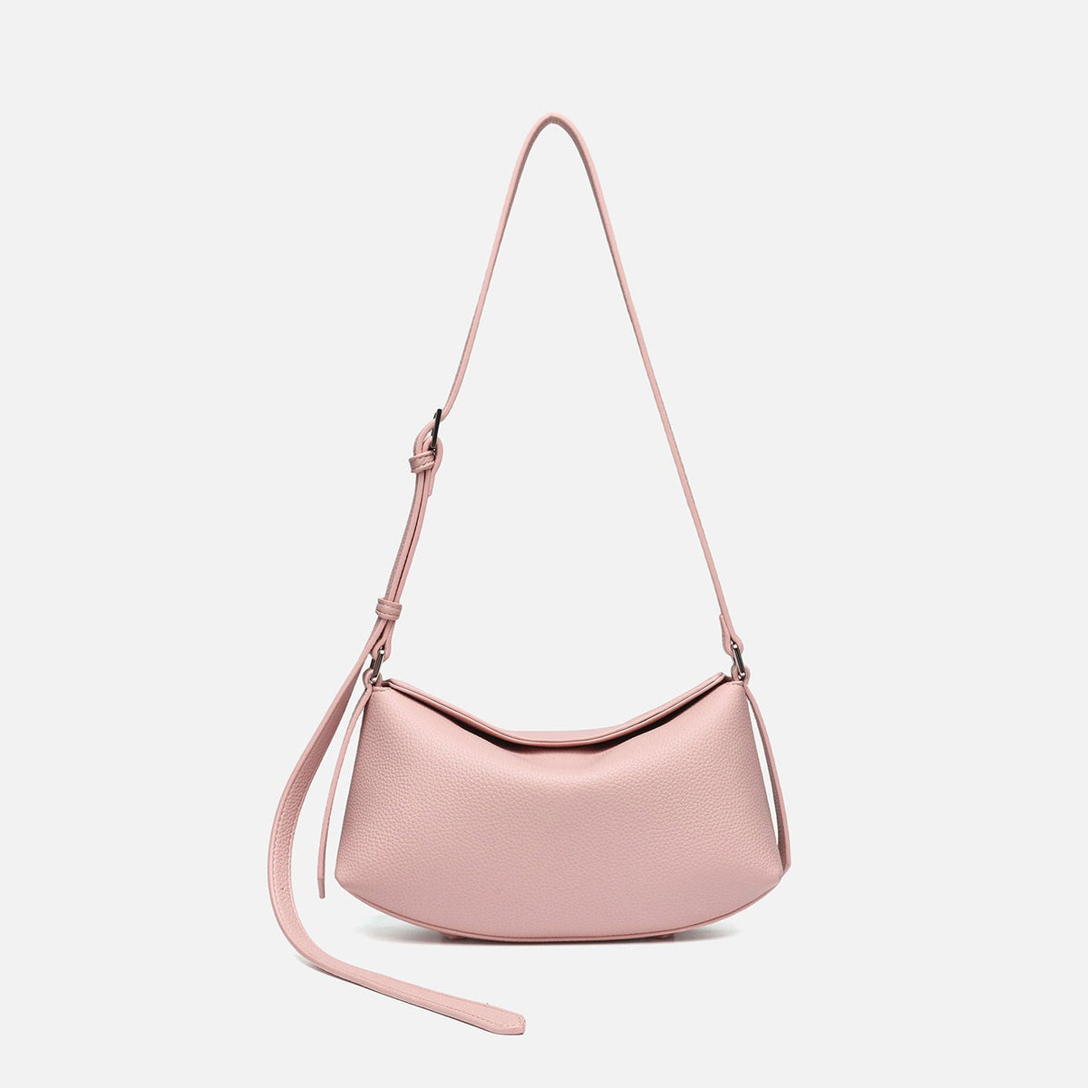 Compact crescent saddle bag with pebbled leather-look finish and adjustable shoulder strap, front view