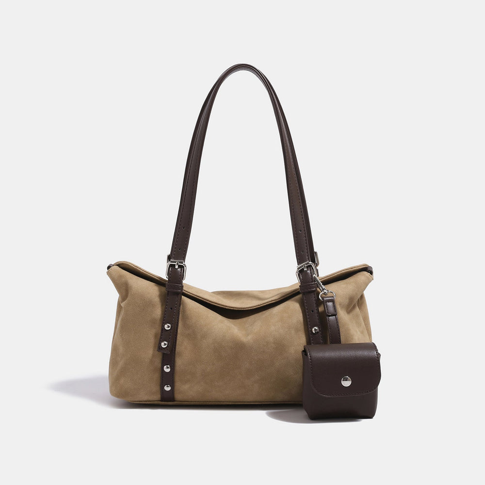 Soft slouchy suede-look shoulder tote with dark brown leather-look trim, silver-tone stud hardware, and attached snap-front