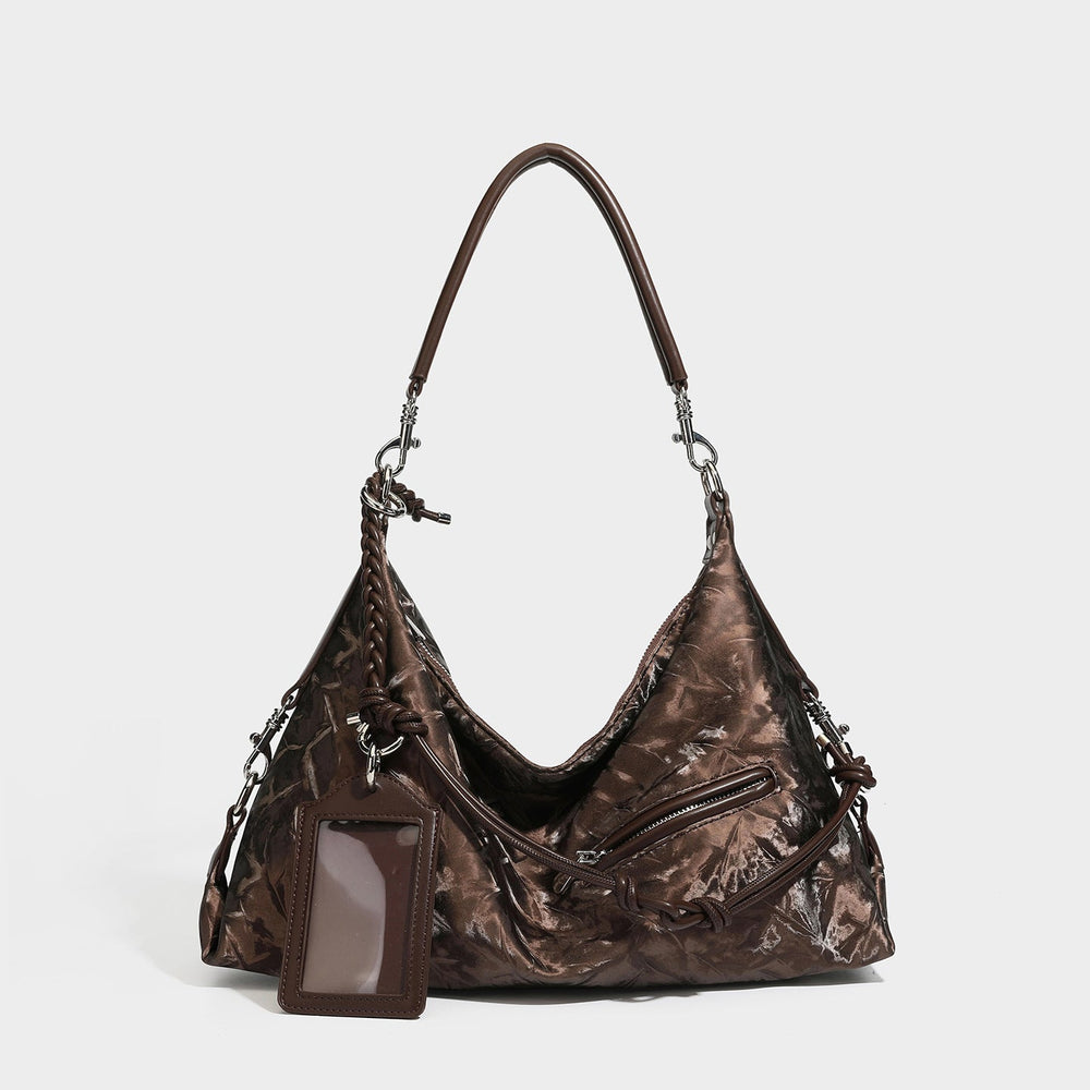 Slouchy hobo shoulder bag in crinkled metallic brown leather-look finish with braided rope knots, silver-tone hardware