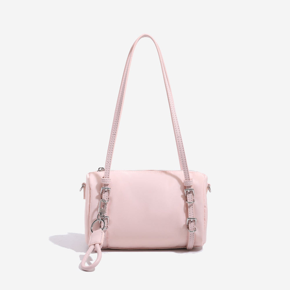 Compact nylon Boston barrel bag with zip-top closure, silver-tone hardware, dual slim handles, and detachable crossbody