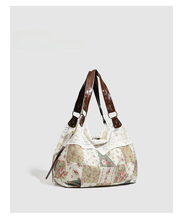 Cream floral patchwork hobo tote bag with crochet lace trim and brown leather-look shoulder straps, detail view 7