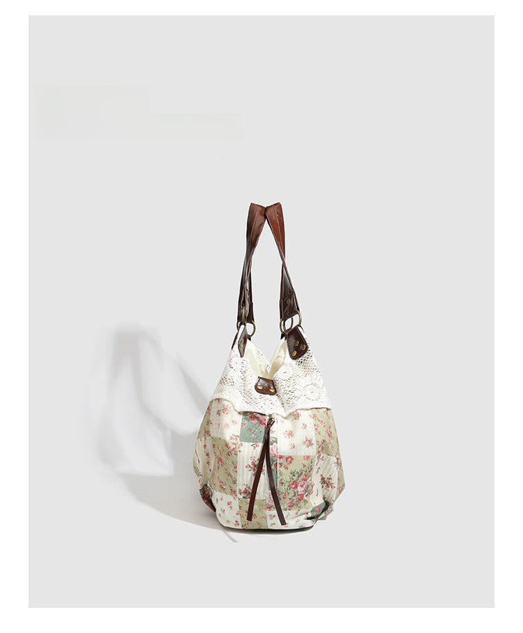 Cream floral patchwork hobo tote bag with crochet lace trim and brown leather-look shoulder straps, detail view 6