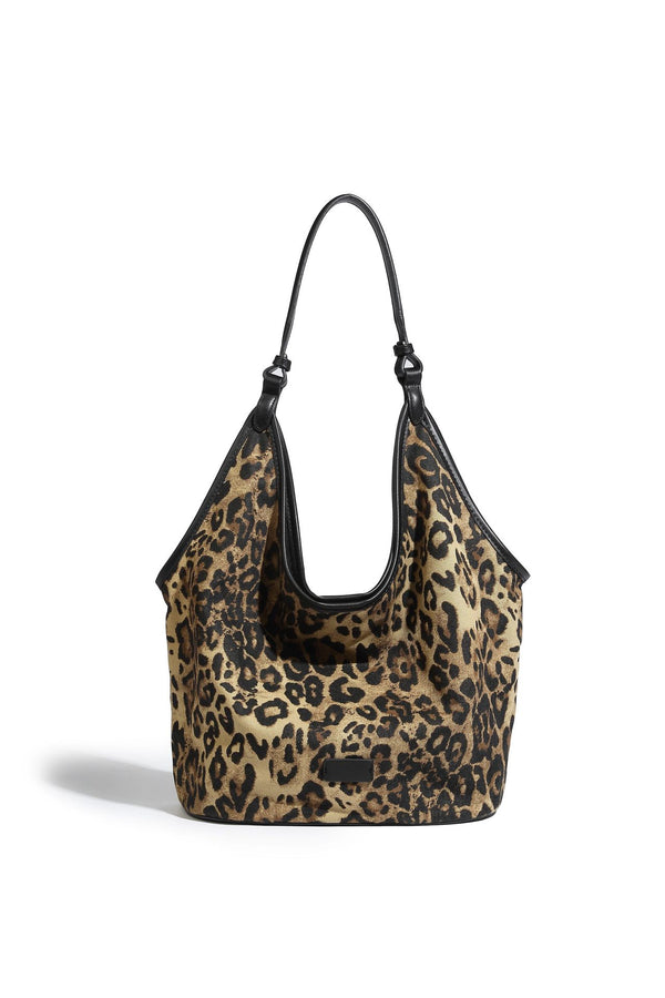 Slouchy brown leopard jacquard hobo tote bag with black leather-look trim and single shoulder strap, shown with black, detail