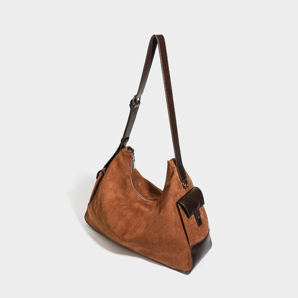 Slouchy cognac brown matte suede-look hobo shoulder bag with dark brown leather-look trim, top zip closure, front flap