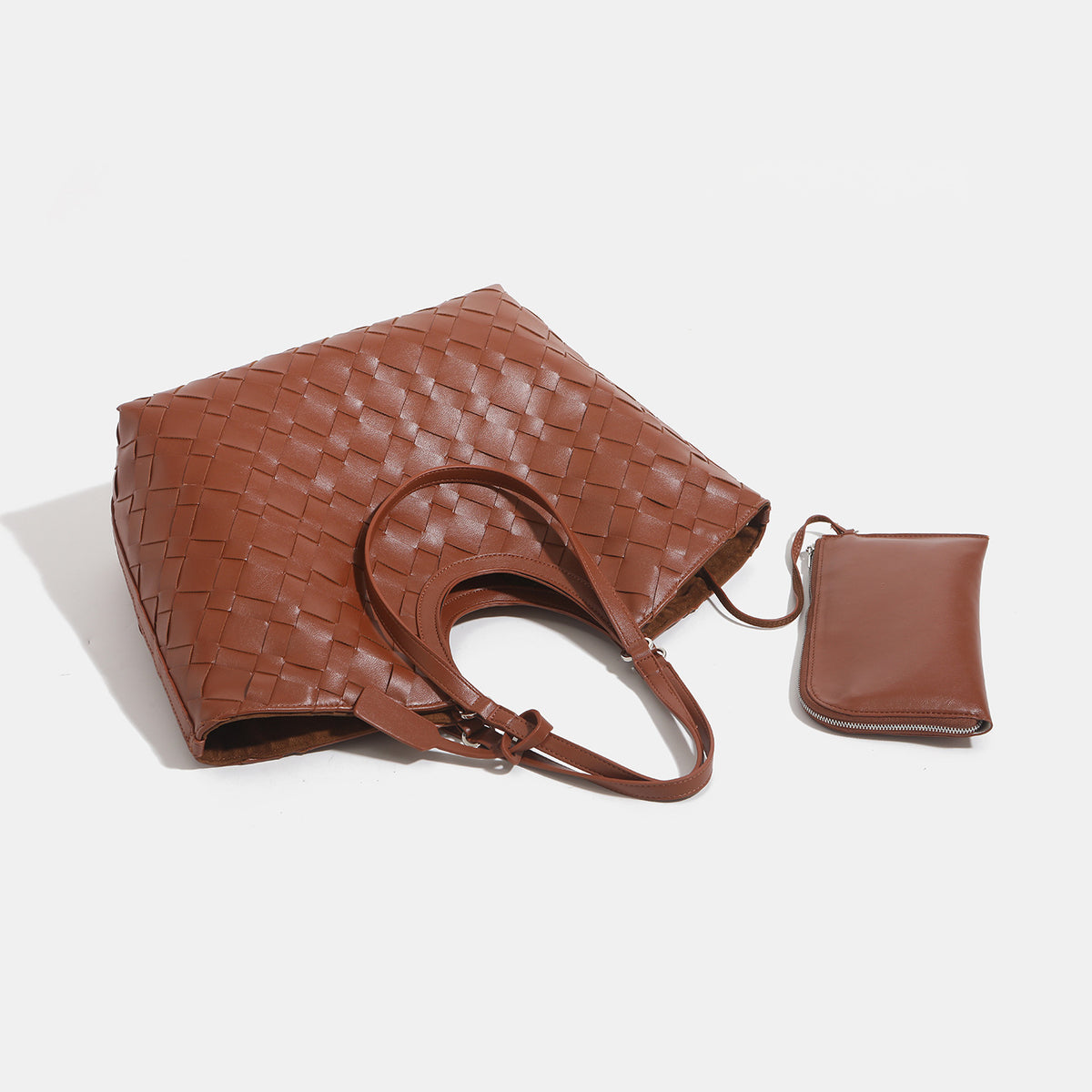 Large woven leather-look tote bag with open top and dual shoulder handles, detail view 4
