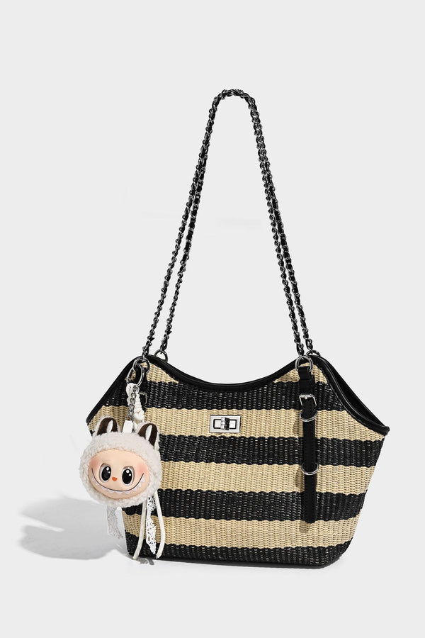 Black and natural striped woven tote bag with chain shoulder strap and silver-tone turn-lock hardware, detail view 13