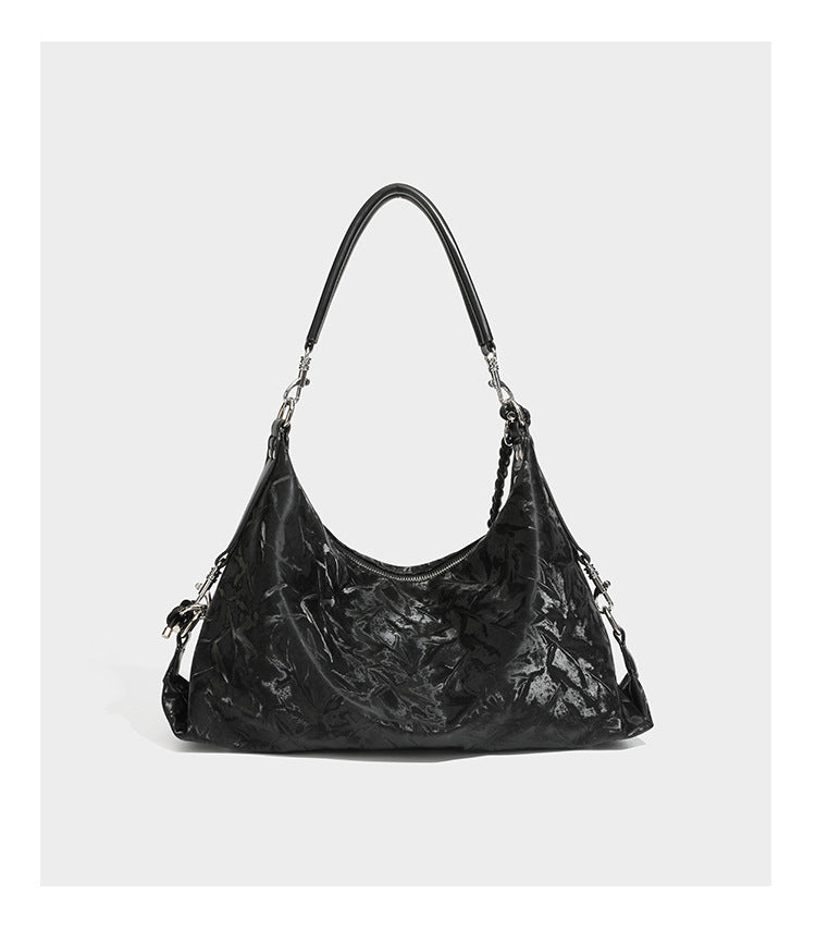 Slouchy hobo shoulder bag in crinkled metallic brown leather-look finish with braided rope knots, silver-tone hardware