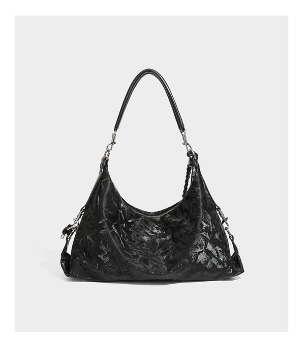 Slouchy hobo shoulder bag in crinkled metallic brown leather-look finish with braided rope knots, silver-tone hardware