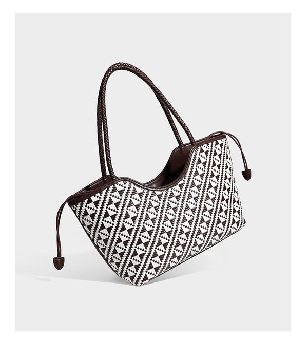 Woven geometric two-tone tote bag with braided shoulder straps and leather-look trim, detail view 15