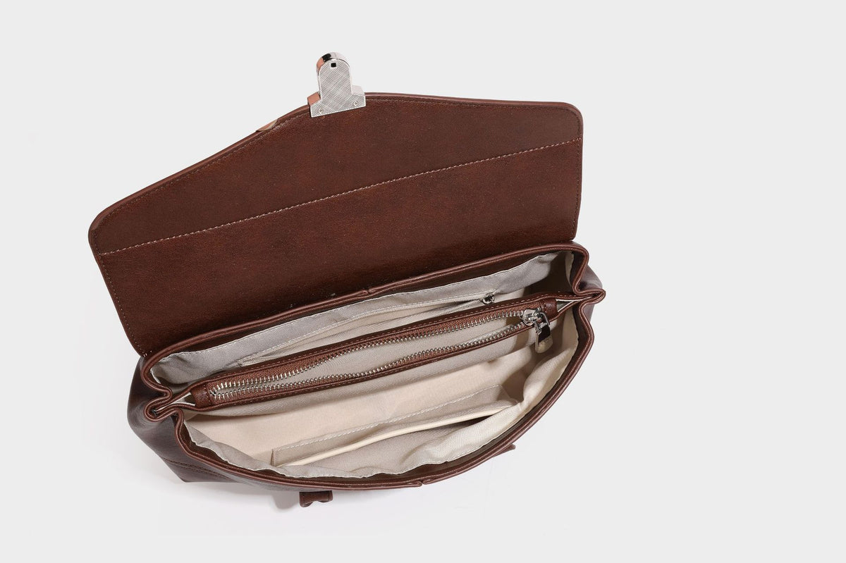 Structured rectangular satchel bag with dual rounded top handles and central metal turn-lock flap closure, detail view 24