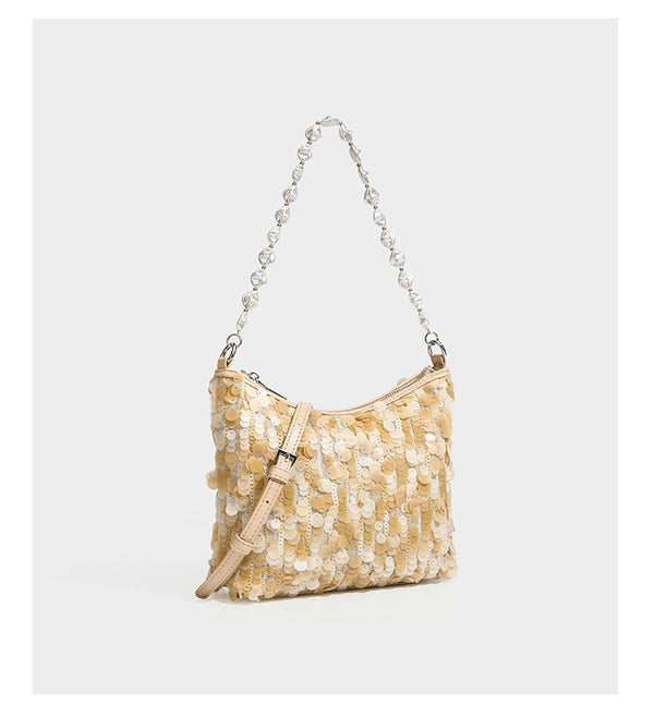 Champagne and ivory large-disc sequin shoulder bag with baroque faux-pearl beaded chain strap and silver-tone zip closure