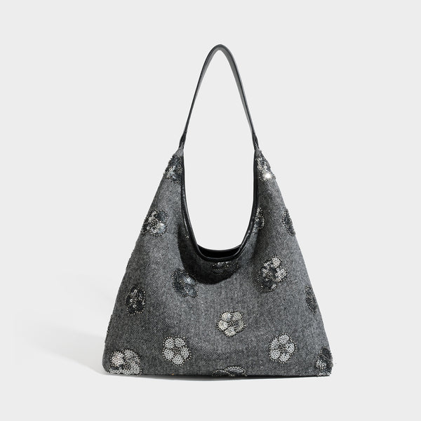 Lässige Trapez-Schulter-Tote in Anthrazit mit floralen Motiven aus silberfarbenen Pailletten, Trageriemen in Lederoptik und herabhängendem, perlenverziertem