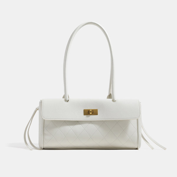 Structured quilted diamond-stitch baguette handbag with gold-tone turn-lock closure and dual top handles, detail view 6