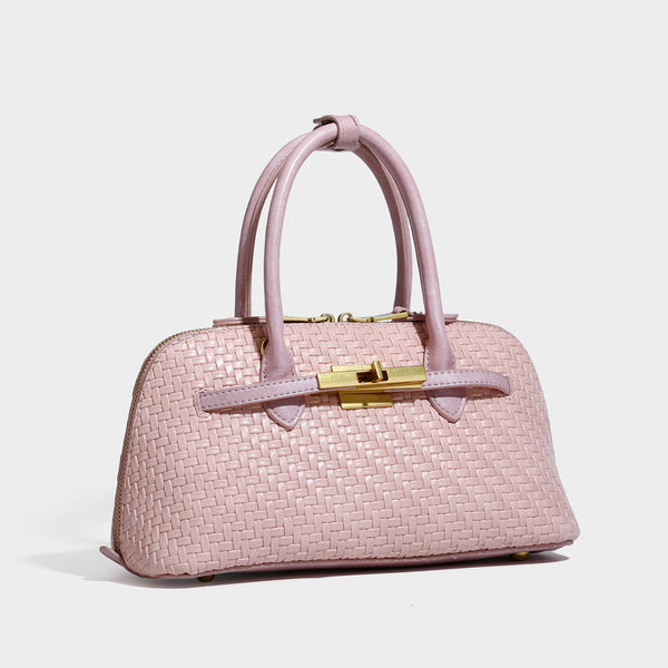Structured woven-embossed leather-look satchel with dual rolled top handles, gold-tone turn-lock closure, and detachable
