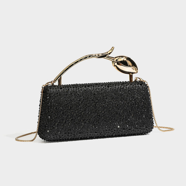 rectangular hard-case rhinestone evening clutch with sculptural gold-tone branch-and-bud top handle and detachable chain