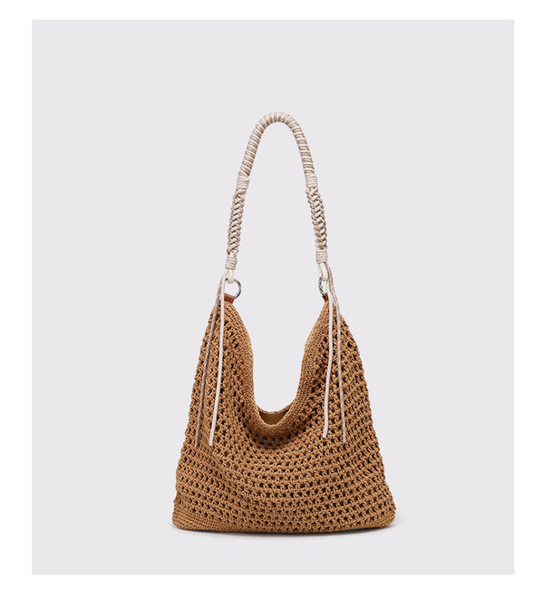 Große cremefarbene Hobo-Schultertasche aus Flechtmaterial mit geflochtenem Kordelriemen und Ringbeschlägen in Silberoptik, Detailansicht 12