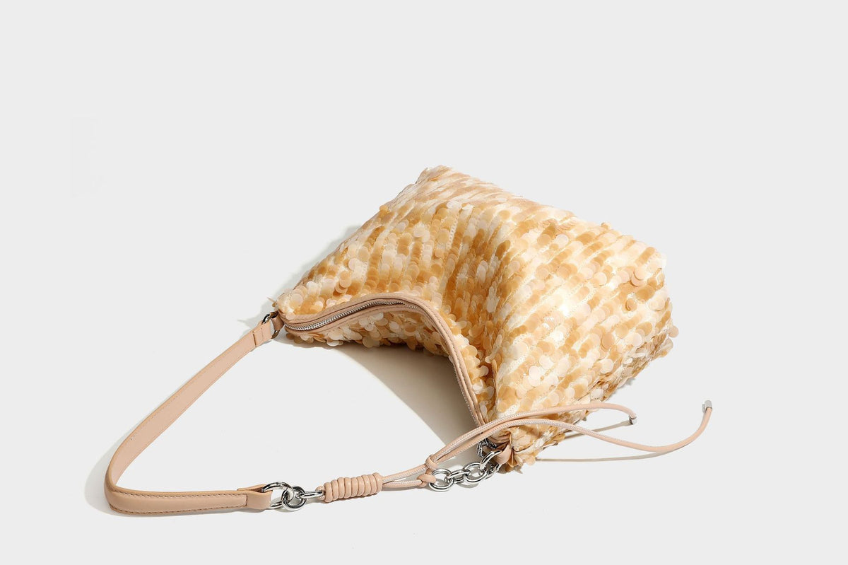 Slouchy paillette sequin hobo shoulder bag with zip closure and adjustable leather-look strap with silver chain hardware