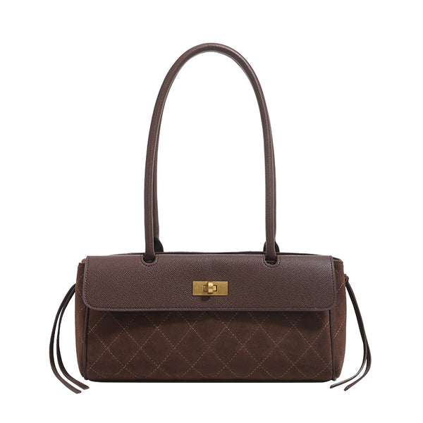 Structured rectangular baguette shoulder bag with diamond quilted lower panel, smooth flap, gold-tone turn-lock closure