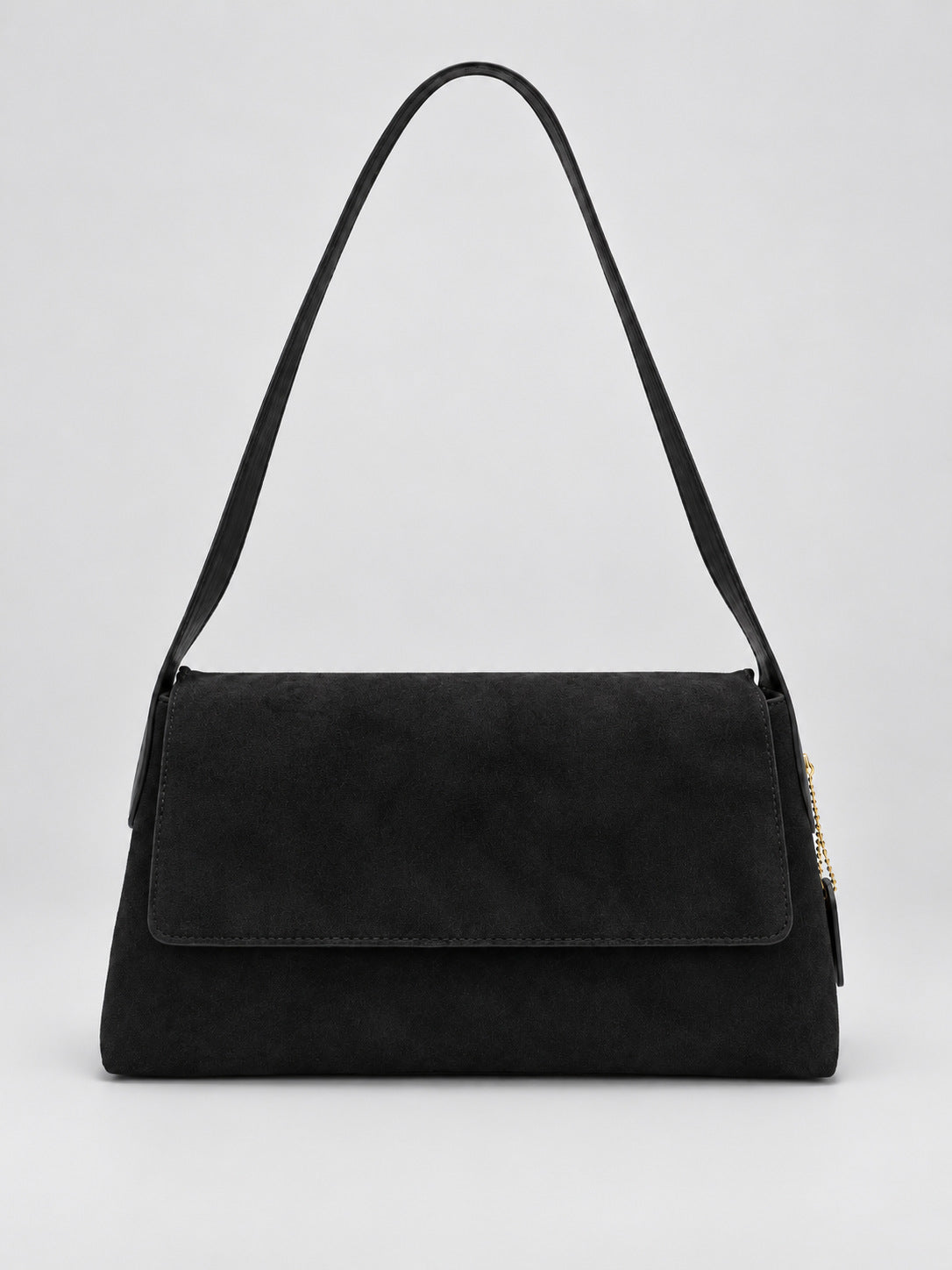 Rectangular matte suede-finish flap shoulder bag with slim dark strap and gold-tone turn-lock hardware, detail view 6