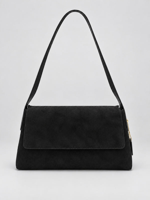 Rectangular matte suede-finish flap shoulder bag with slim dark strap and gold-tone turn-lock hardware, detail view 6