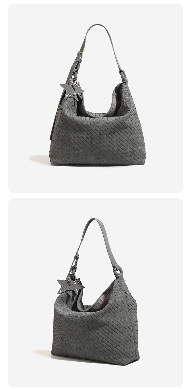 Slouchy woven hobo shoulder bag with matte suede-like finish, adjustable strap, and star charm hardware, detail view 11