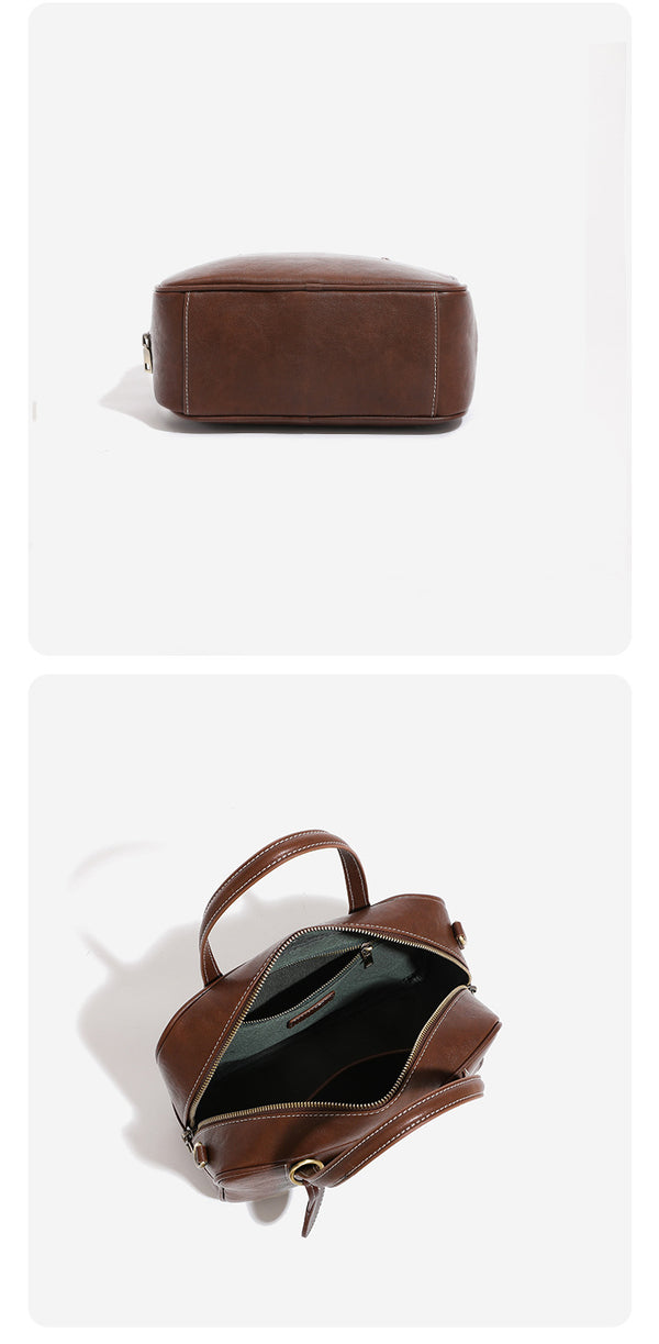 Structured boxy bowling-style tote bag in deep brown leather-look finish with dual top handles, front slip pocket, round