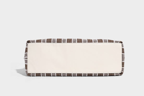 Slouchy striped canvas hobo shoulder bag with cream trim and long knotted strap, detail view 13