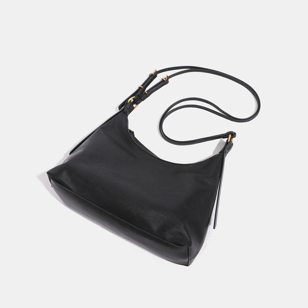 Slouchy hobo shoulder bag in smooth leather-look finish with gold-tone hardware and adjustable strap, detail view 4