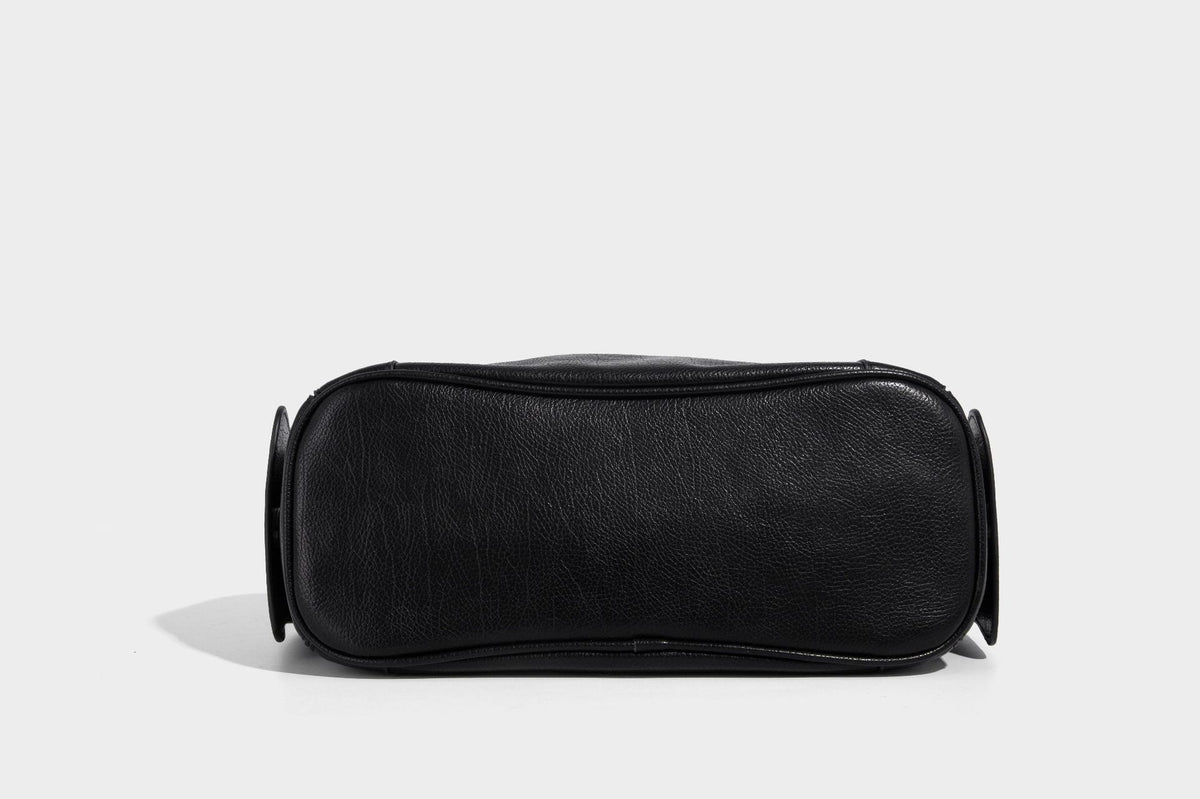 Soft pebbled leather-look hobo shoulder bag with zip top closure, side flap pockets, and silver-tone hardware, detail view 24