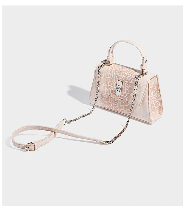 Small structured crocodile-embossed glossy top-handle satchel bag with silver-tone turn-lock clasp and detachable shoulder
