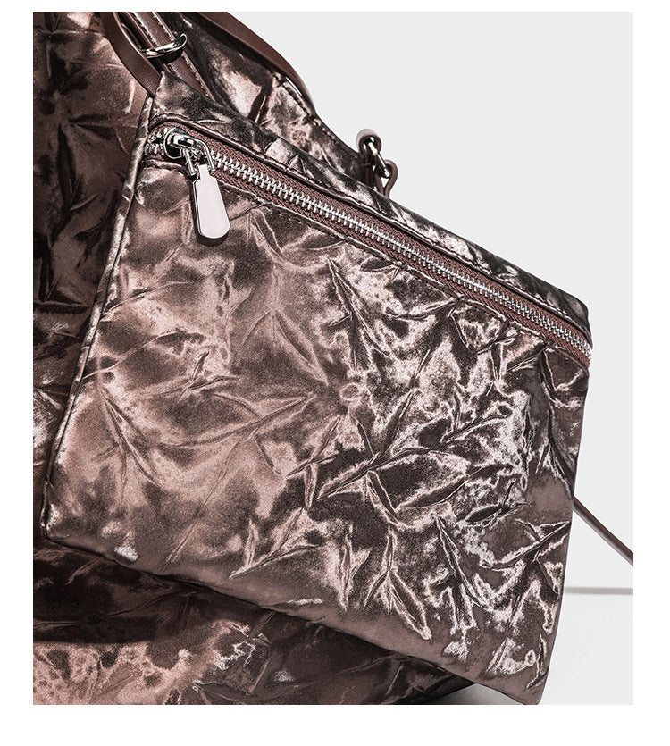 Slouchy crinkle-finish shoulder tote bag with silver hardware and attached zip pouch, detail view 20