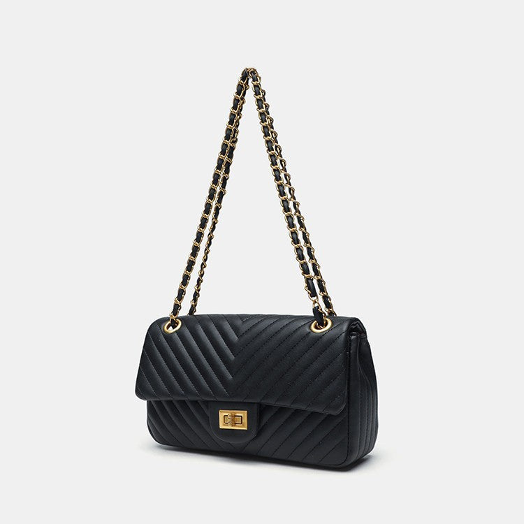 Structured quilted flap bag with gold-tone chain strap and turn-lock closure, detail view 2