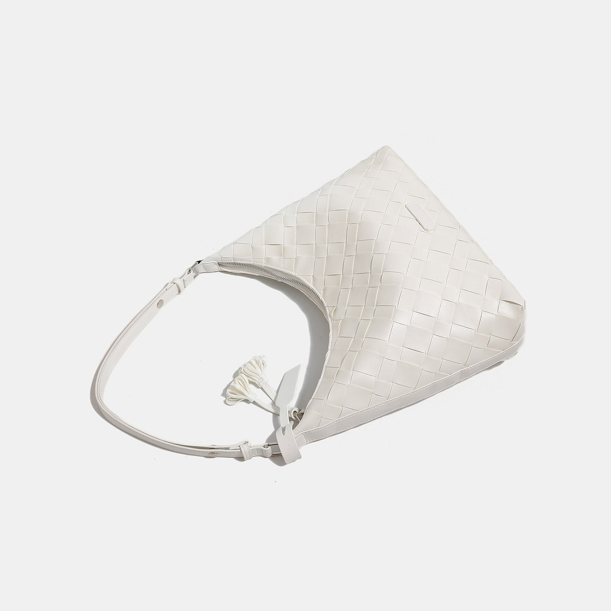 Large woven checker hobo shoulder bag with slim strap, silver-tone hardware, and braided tassel zipper pull, detail view 4