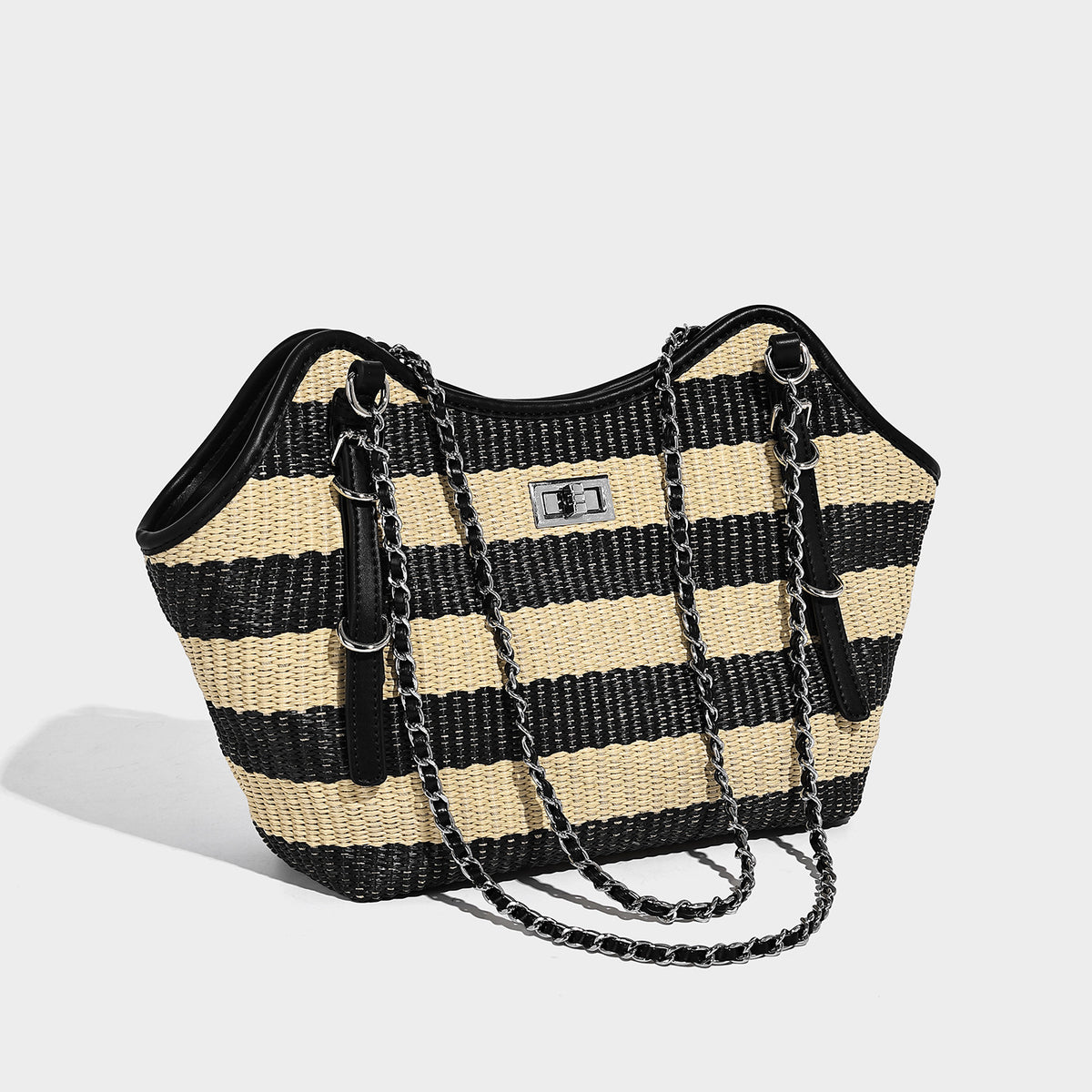 Black and natural striped woven tote bag with chain shoulder strap and silver-tone turn-lock hardware, detail view 4
