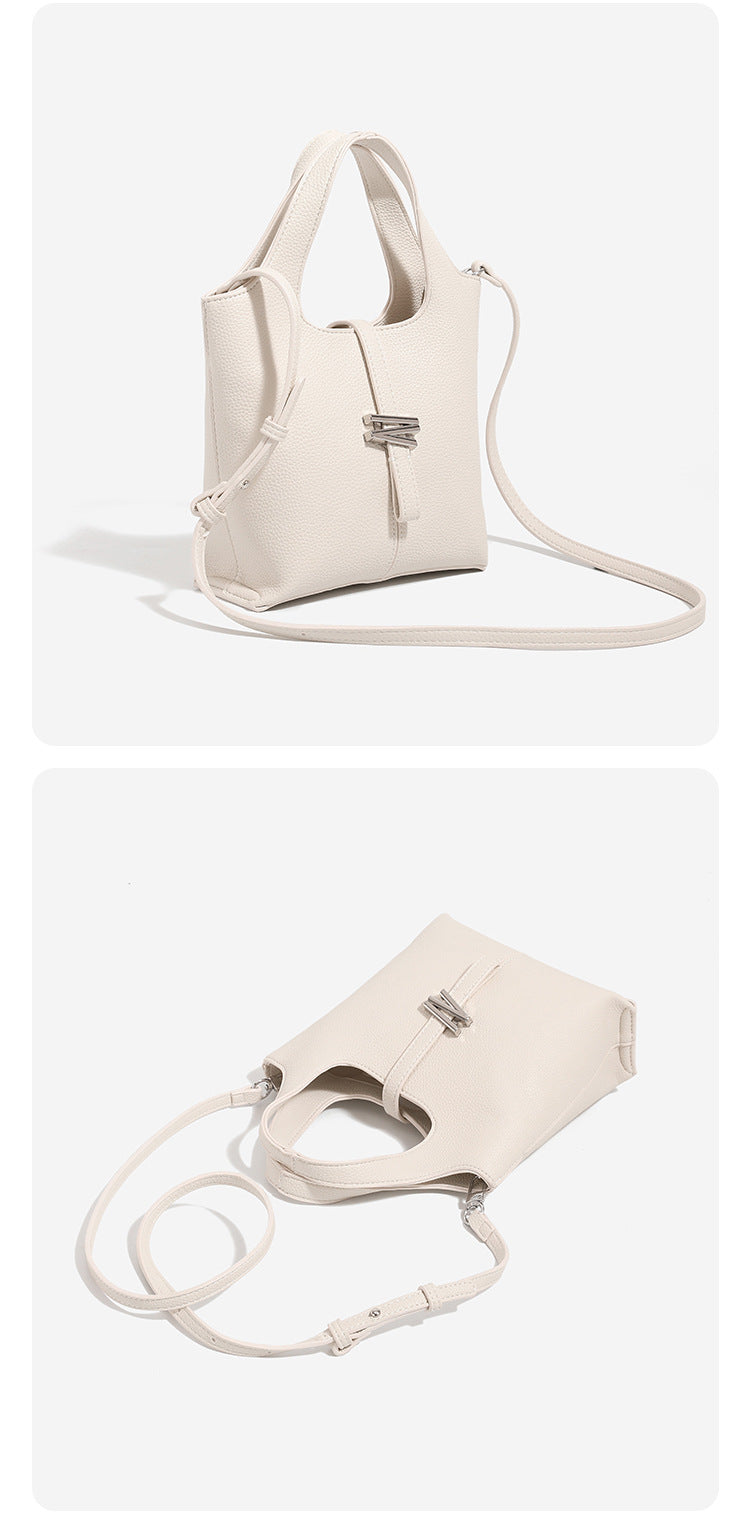 Mini pebbled leather-look bucket tote with silver toggle clasp and dual top handles, detail view 15