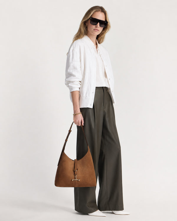 Slouchy hobo shoulder bag with gold-tone toggle ring hardware and adjustable strap, detail view 10