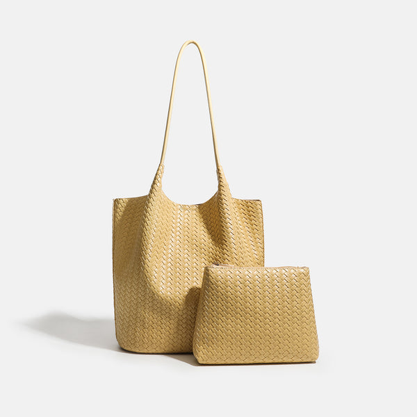 Large woven textured tote bag with long shoulder straps and structured rectangular base, detail view 2