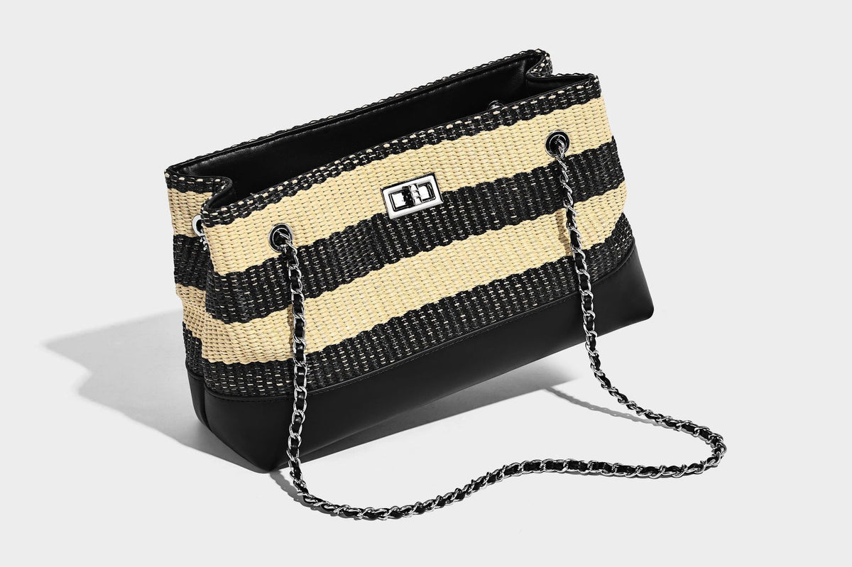 Structured black and beige striped woven shoulder bag with silver chain strap and turn-lock metal clasp, detail view 16