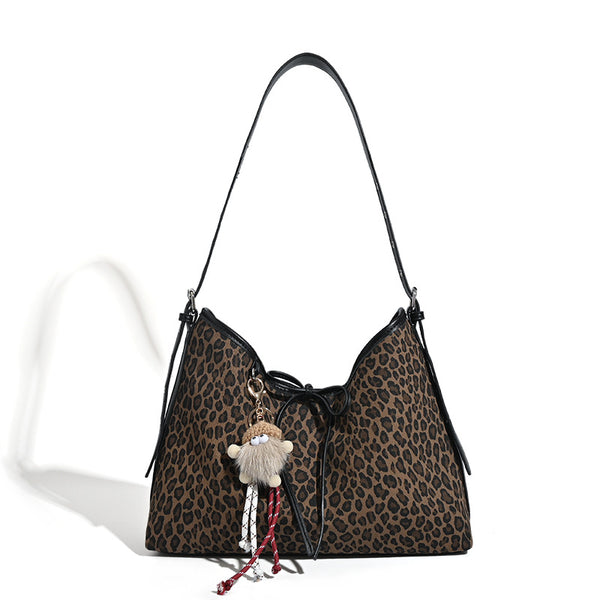 Lässige Hobo-Tasche mit braun-schwarzem Leopardenmuster, Schleifen-Kordelzug, schwarzem Lederimitatbesatz und silberfarbener Niete