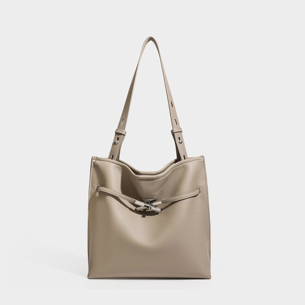 Large structured tote bag in pebbled leather-look finish with silver-tone twist-knot front detail and adjustable shoulder