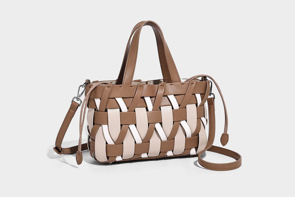 Small structured woven lattice tote bag with dual top handles and detachable shoulder strap in brown and cream leather-look