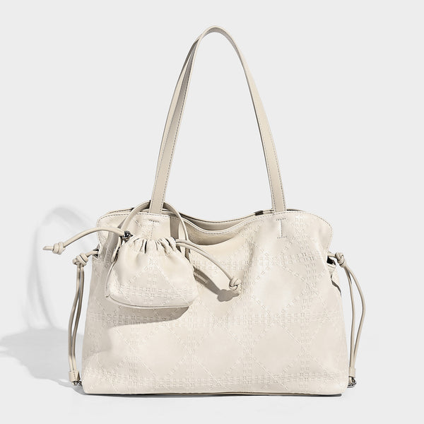 Große Tote-Schultertasche in Elfenbein-Creme mit geprägter Oberfläche, zwei langen Trageriemen, seitlicher Kordelraffung und abnehmbarem