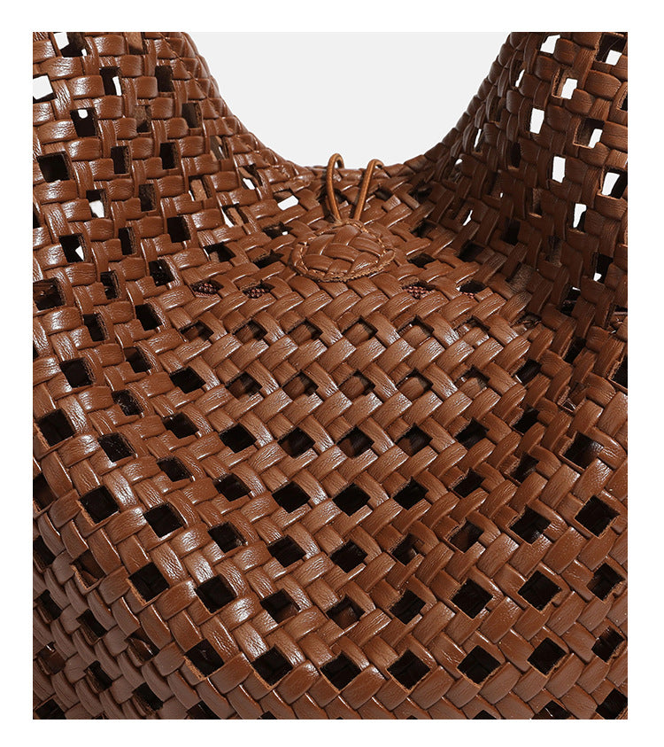 Brown open-lattice woven leather-look hobo shoulder bag with braided strap and matching zip pouch, detail view 27