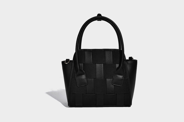 Small structured woven-panel mini tote bag with double top handles and detachable crossbody strap in matte leather-look