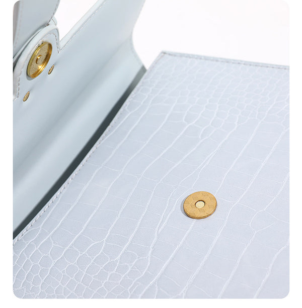 Structured crocodile-embossed flap shoulder bag with gold chain buckle hardware and adjustable strap, detail view 17
