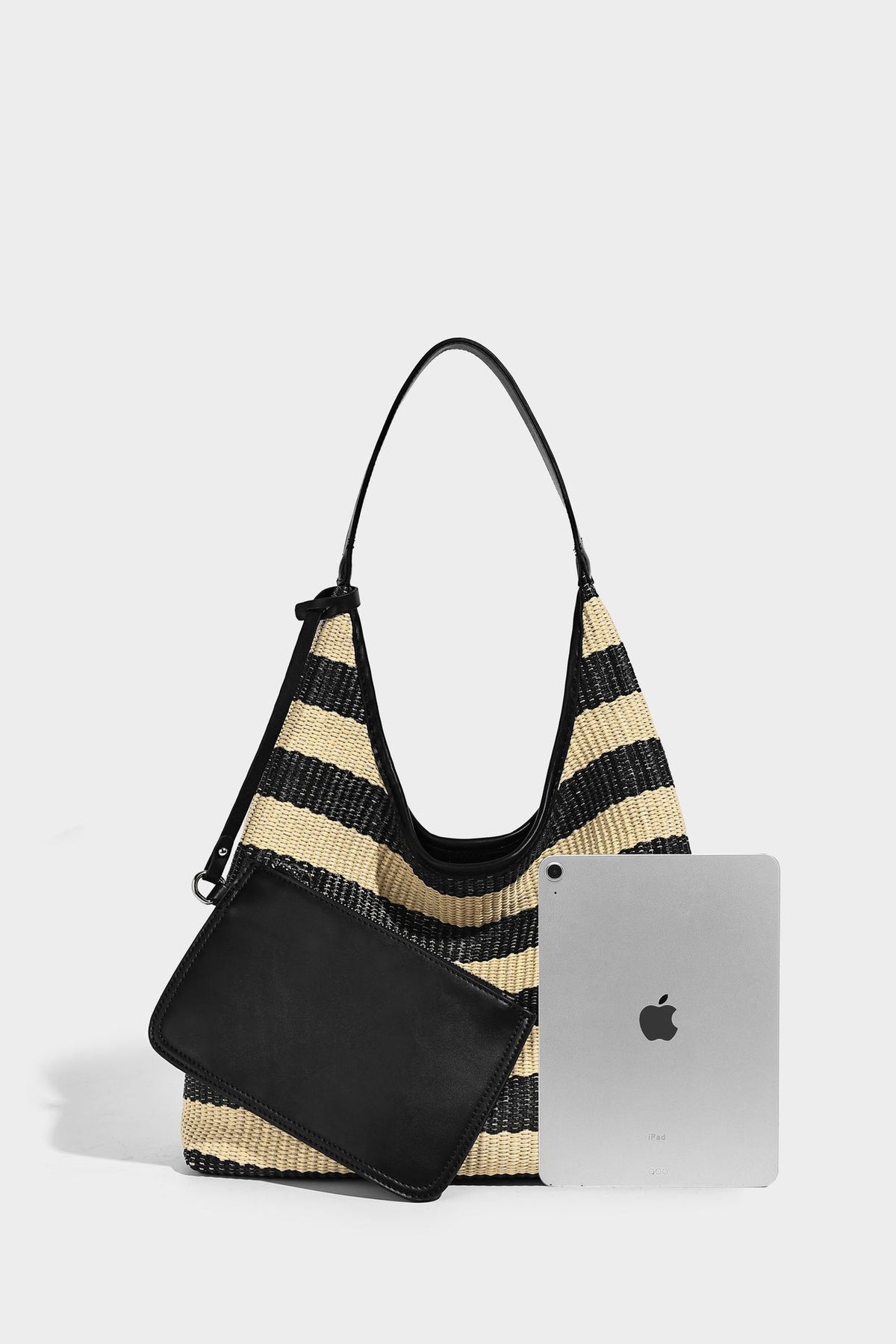 Black and beige striped woven shoulder tote bag with leather-look trim and detachable black zip pouch, detail view 12