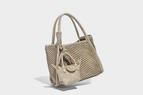 Large structured woven rope-texture tote bag with smooth leather-look trim, knotted dual top handles, detachable mini front