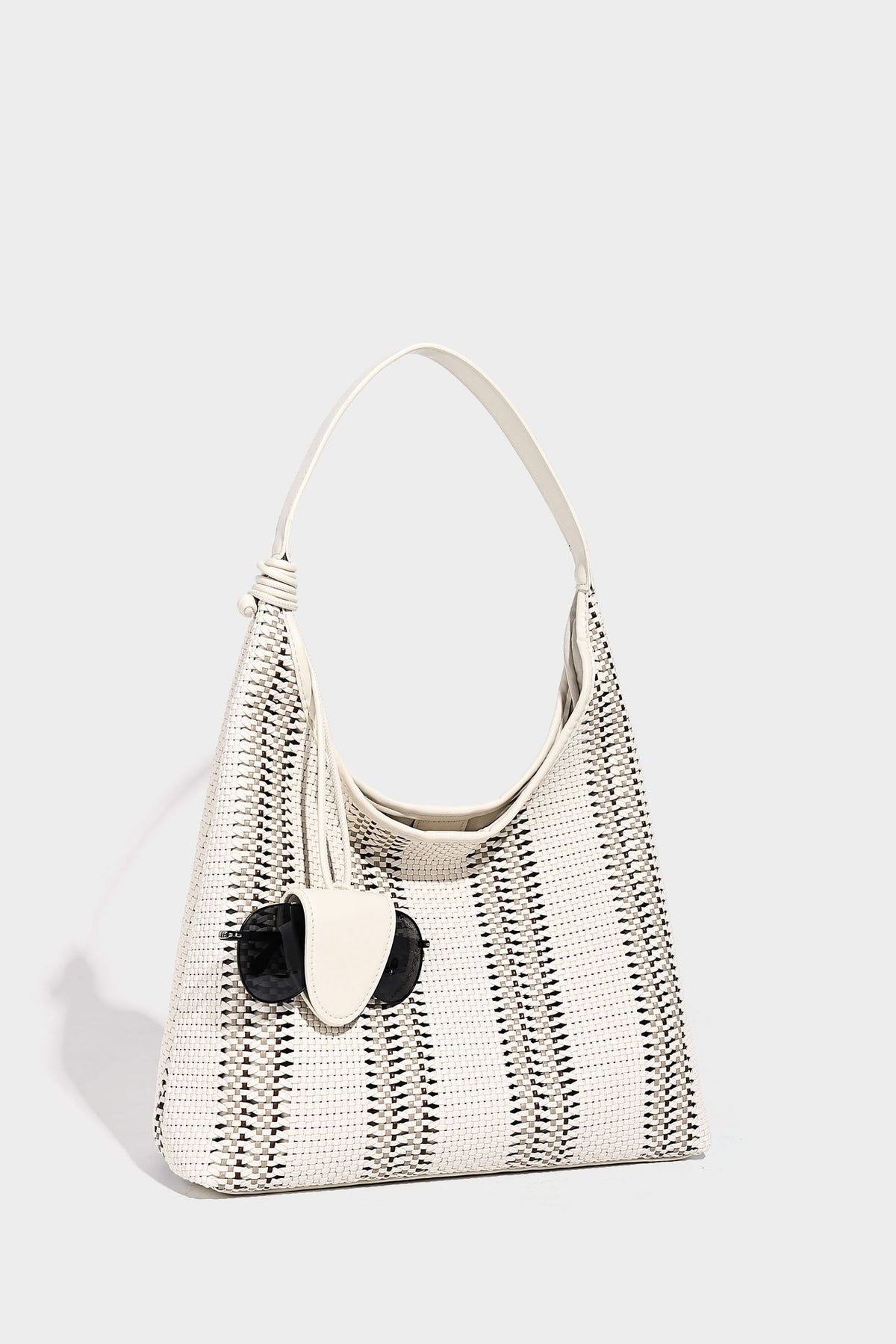 Woven striped slouch shoulder tote bag with knotted strap and attached front flap pouch, detail view 25