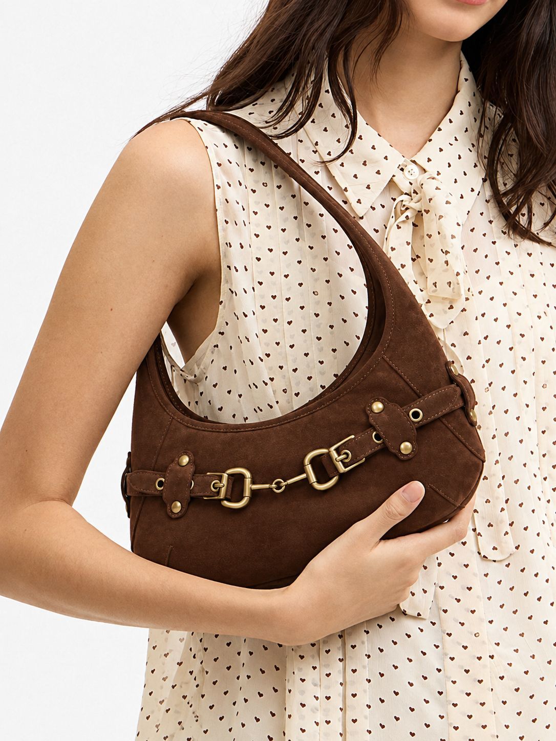 Matte suede-finish half-moon shoulder bag with gold horsebit bar hardware and dome studs, detail view 11