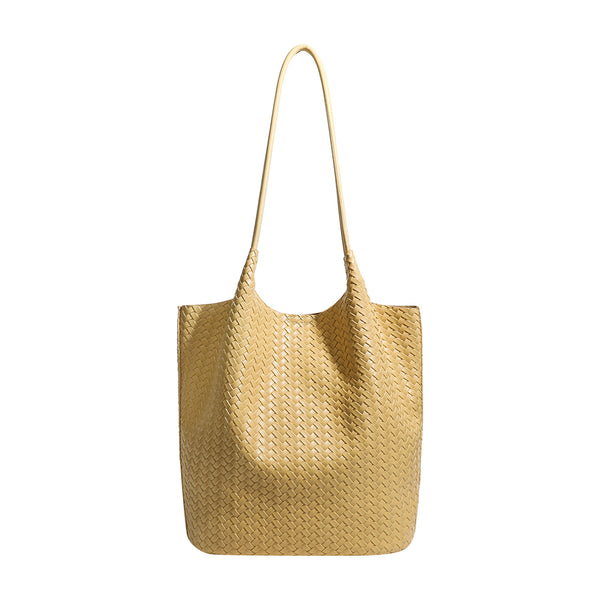 Large woven textured tote bag with long shoulder straps and structured rectangular base, detail view 5
